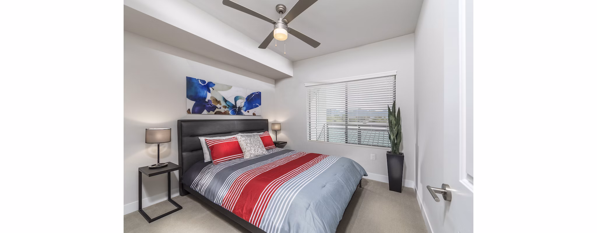 Cozy bedroom with elegant decor in Overture Kierland, luxury apartments by Greystar