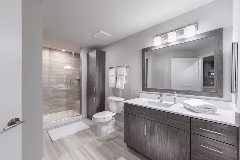 Luxurious bathroom with marble countertops at Overture Kierland
