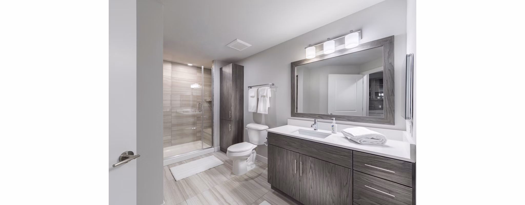 Luxurious bathroom with marble countertops at Overture Kierland
