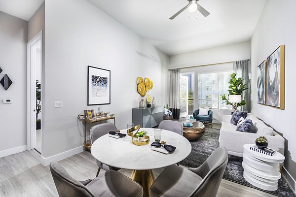 Spacious living room with modern decor at Overture Kierland luxury apartments