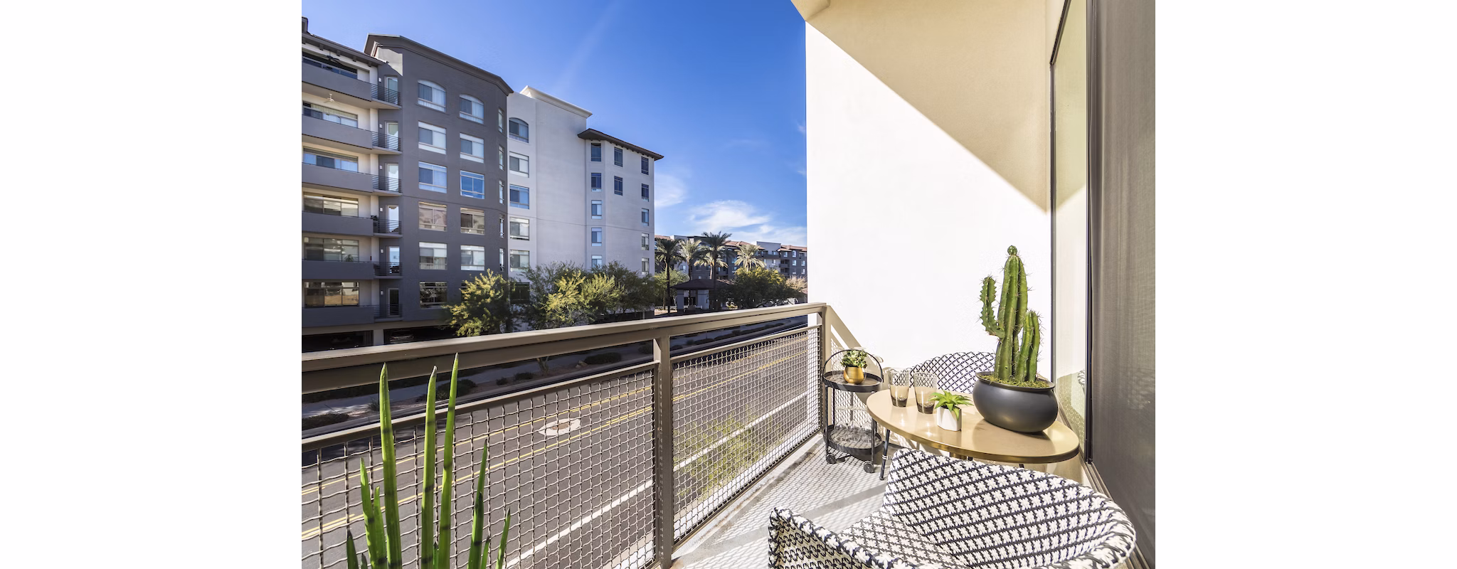 Spacious patio with stylish seating overlooking scenic views at Overture Kierland luxury apartments