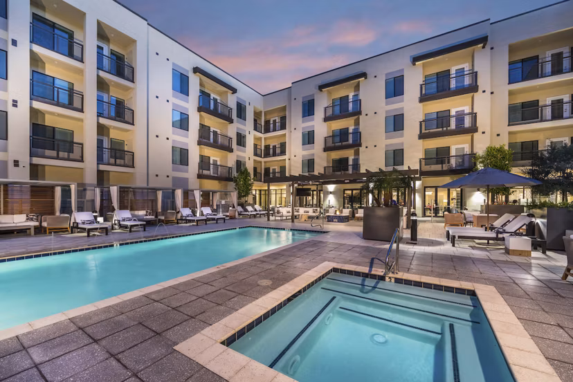 Resort-style pool with sun loungers at Overture Kierland luxury apartments