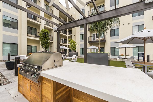Outdoor grill area with modern appliances at Overture Kierland, luxury retirement community in Scottsdale