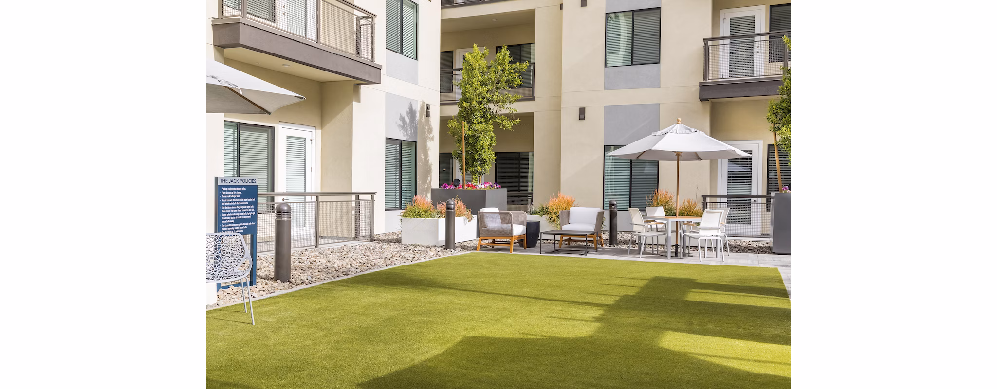Well-designed recreational area at Overture Kierland featuring modern seating and lush greenery