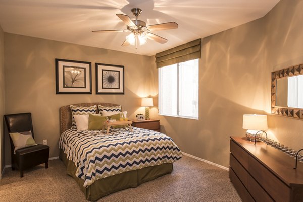 Modern bedroom with elegant design at Santa Rosa Apartments in Greystar community