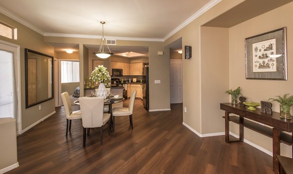 Dining room with elegant dining set and modern lighting at Santa Rosa Apartments, Greystar luxury apartments