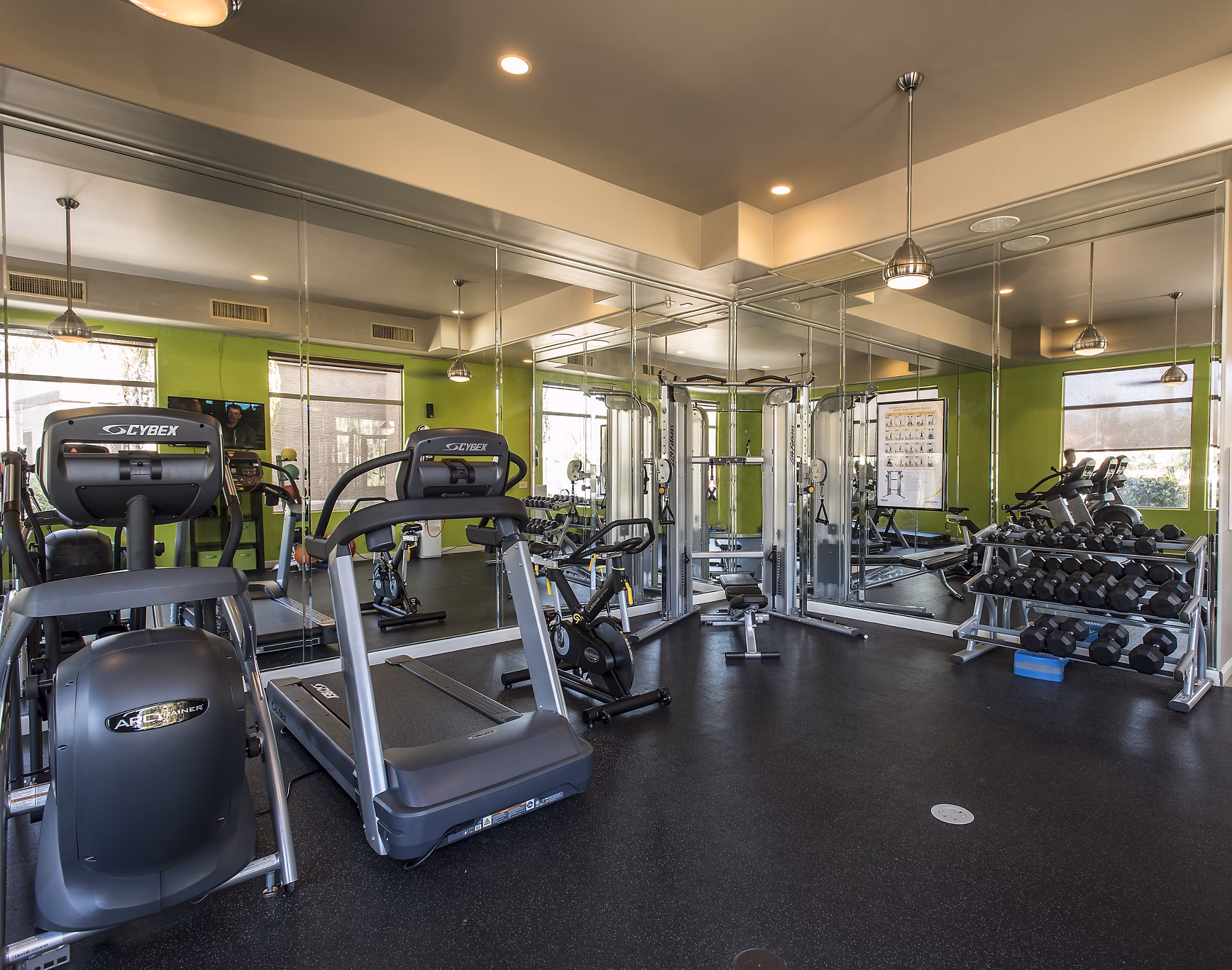 Fitness center equipped with modern workout machines at Santa Rosa Apartments, a Greystar luxury property in Santa Rosa
