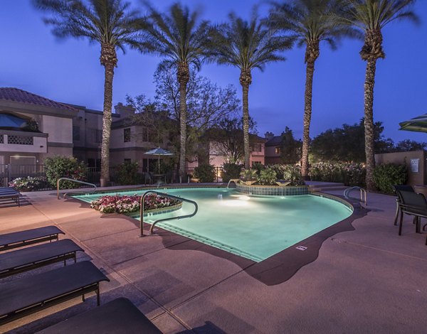 Inviting pool area with lounge chairs at Santa Rosa Apartments, offering luxury living experiences