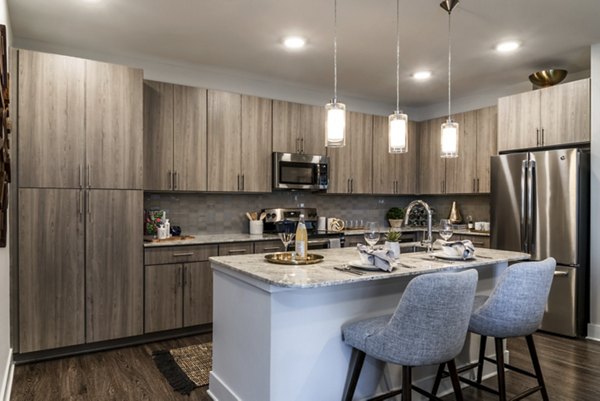 Spacious kitchen with modern appliances at Overture Cotswold luxury apartments