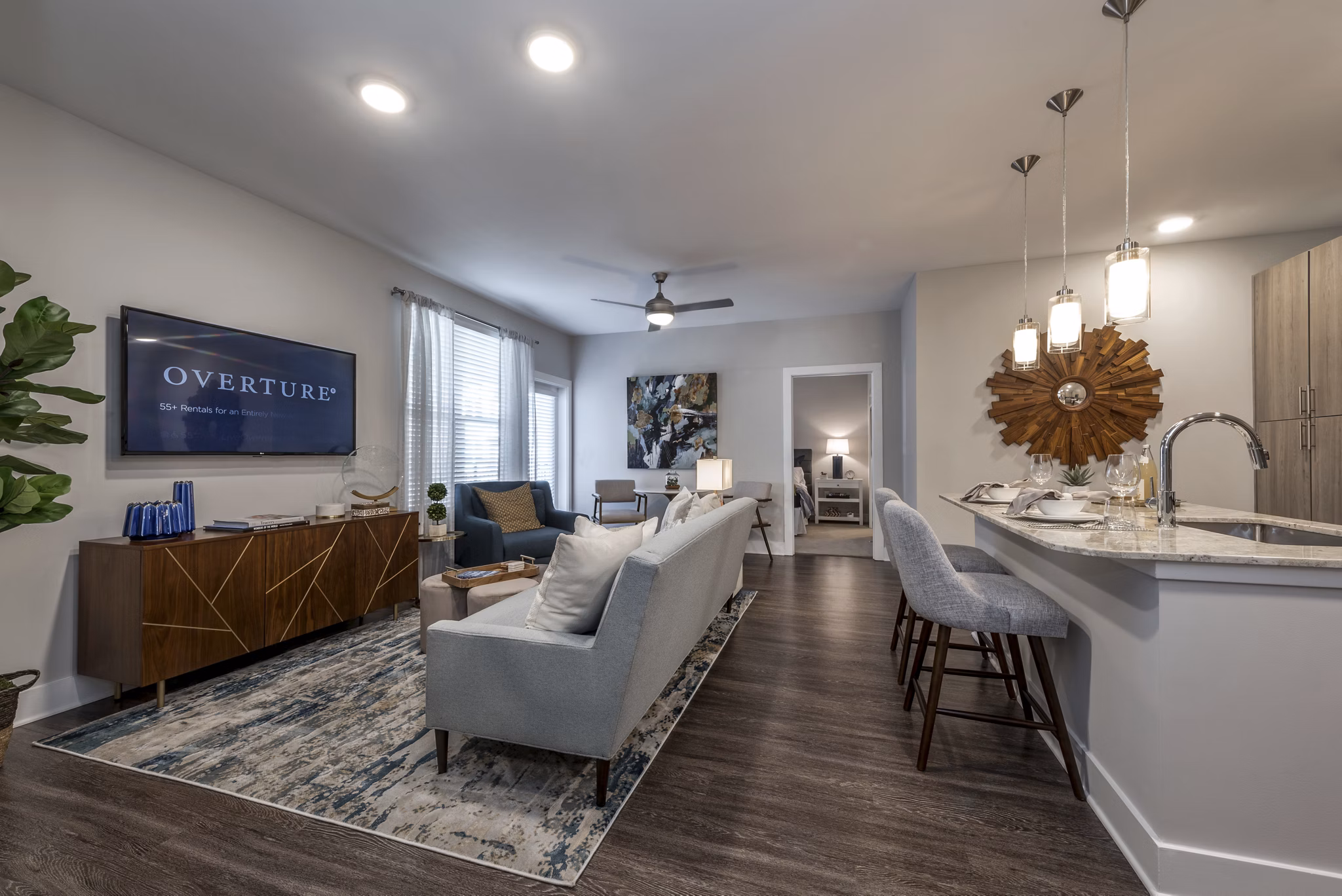 Modern living room and kitchen with stylish decor and an inviting layout in luxury apartments