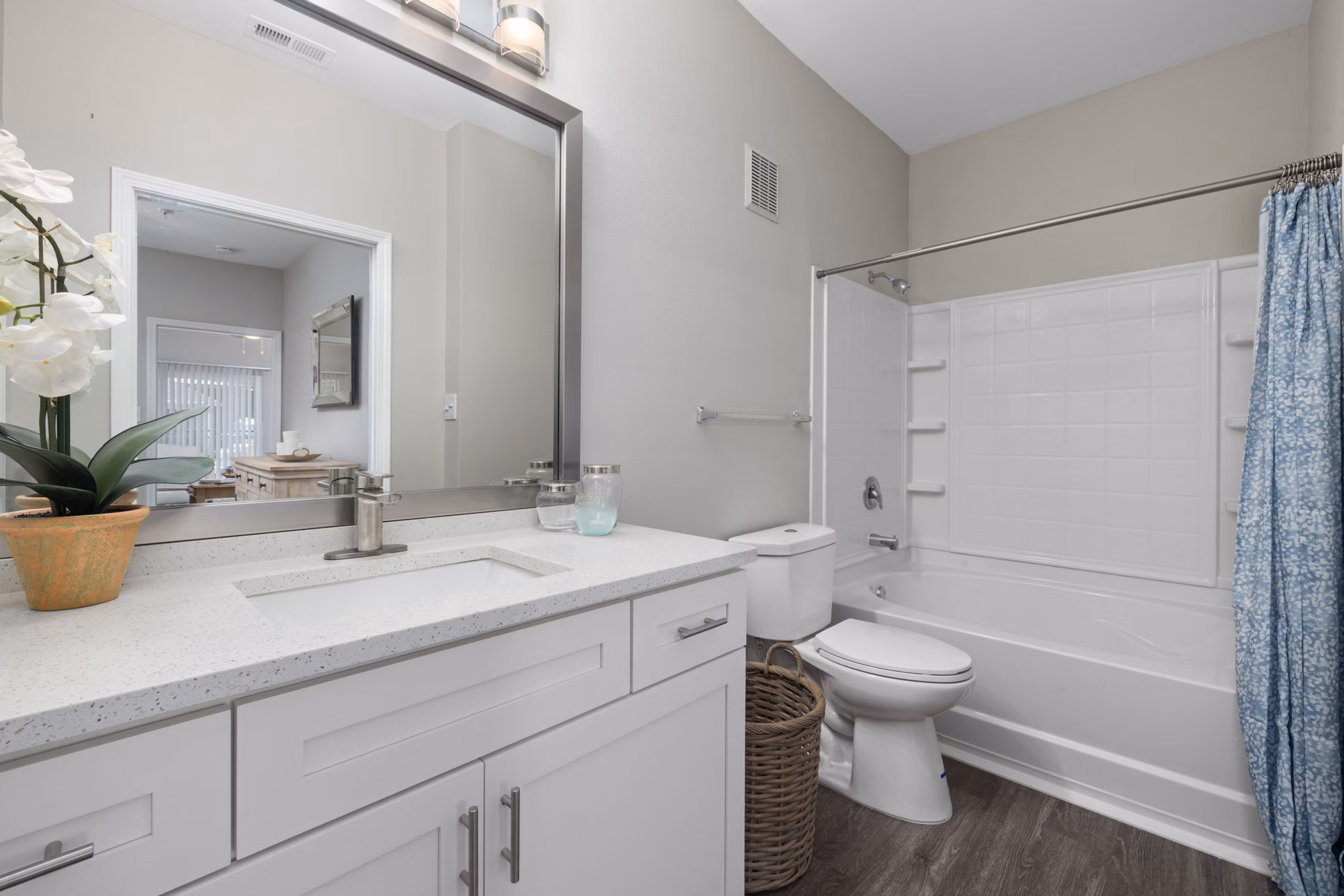 Modern bathroom with sleek fixtures at Cary Greens at Preston Apartments, offering luxury living spaces