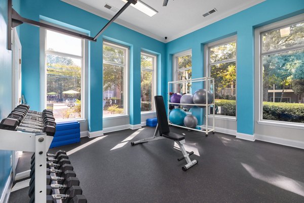 State-of-the-art fitness center with modern equipment at Cary Greens at Preston Apartments