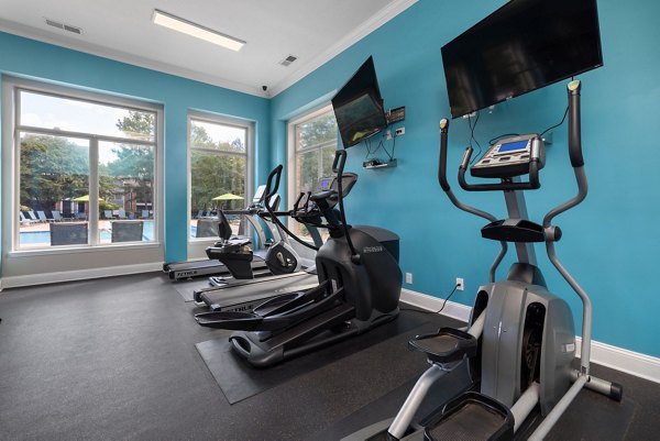 fitness center at Cary Greens at Preston Apartments 