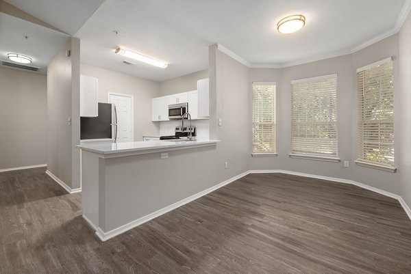 living room at Cary Greens at Preston Apartments 