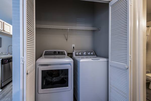 laundry room at Cary Greens at Preston Apartments
