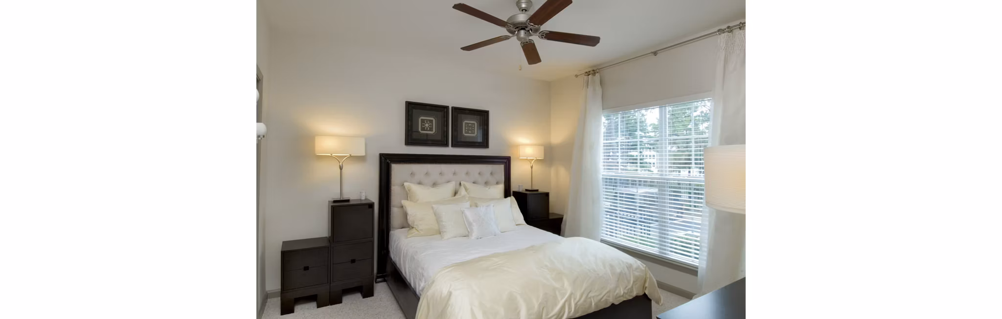 Cozy bedroom with modern decor at Avana City North Apartments