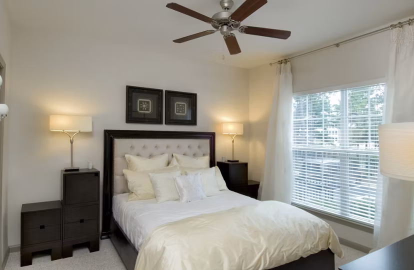 Cozy bedroom with modern decor at Avana City North Apartments