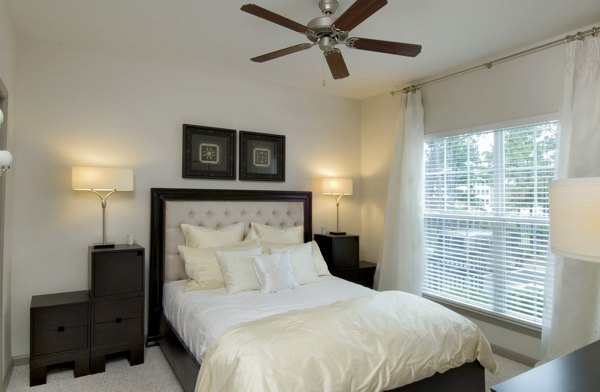 Cozy bedroom with modern decor at Avana City North Apartments