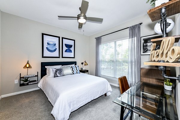 Cozy bedroom with modern decor at Avana City North Apartments