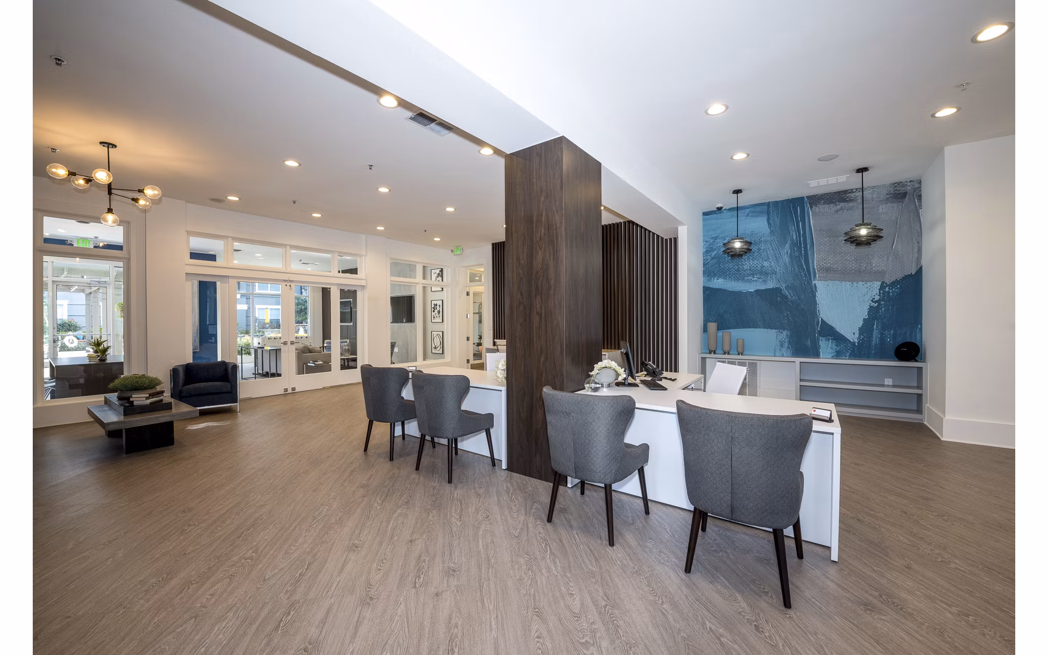 Modern clubhouse featuring fitness center at Avana City North Apartments