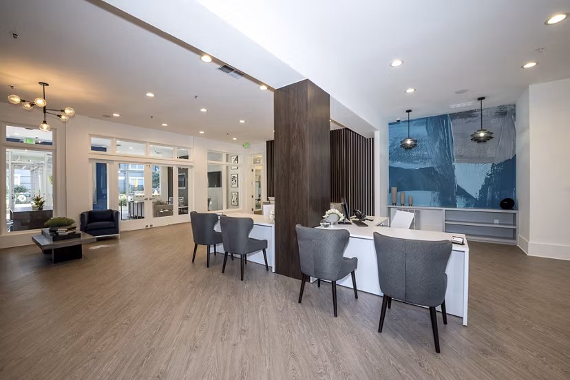 Modern clubhouse featuring fitness center at Avana City North Apartments