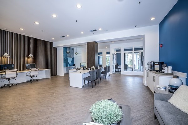 Leasing office with modern decor at Avana City North Apartments clubhouse
