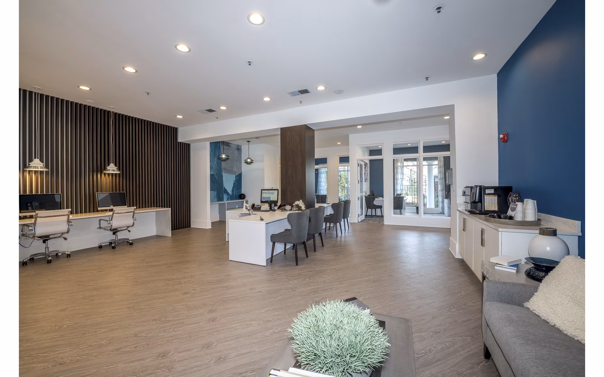 Clubhouse with modern design and stylish seating at Avana City North Apartments
