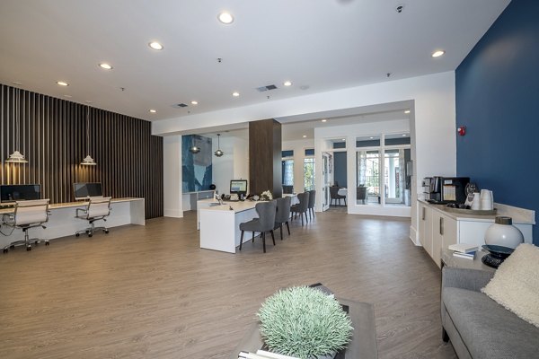 Clubhouse with modern design and stylish seating at Avana City North Apartments