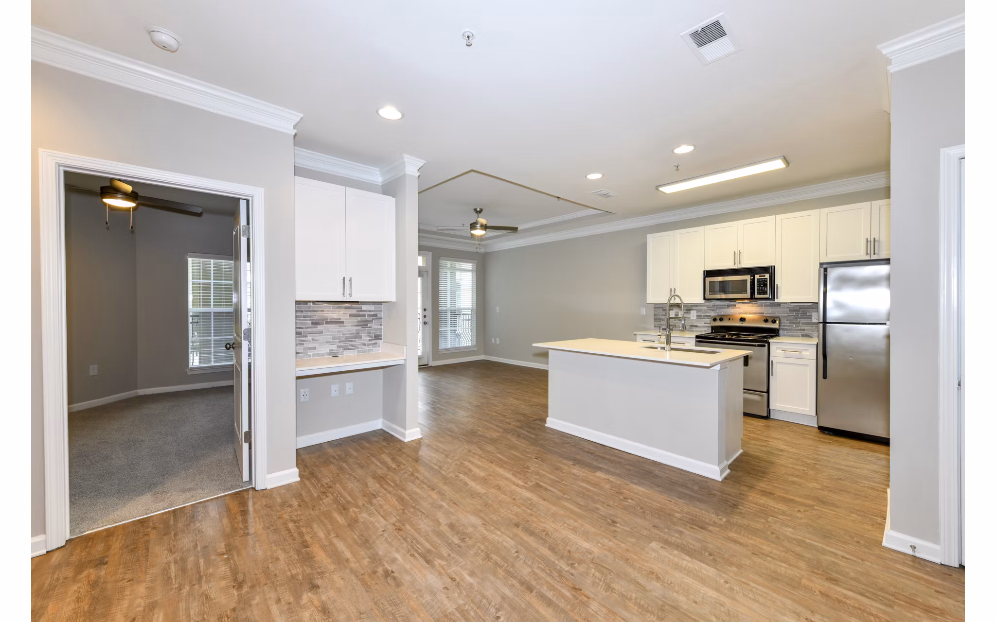 Dining room featuring chic modern decor in Avana City North Apartments, designed for luxury living