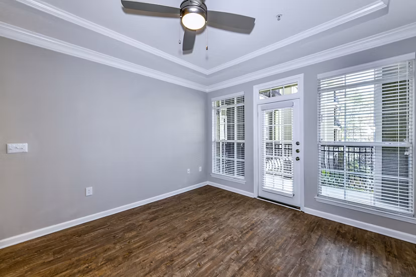 Spacious living room with modern decor at Avana City North Apartments in a luxury setting