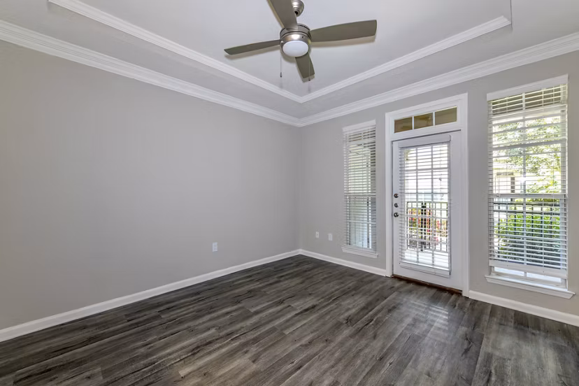 Spacious living room with modern decor at Avana City North Apartments