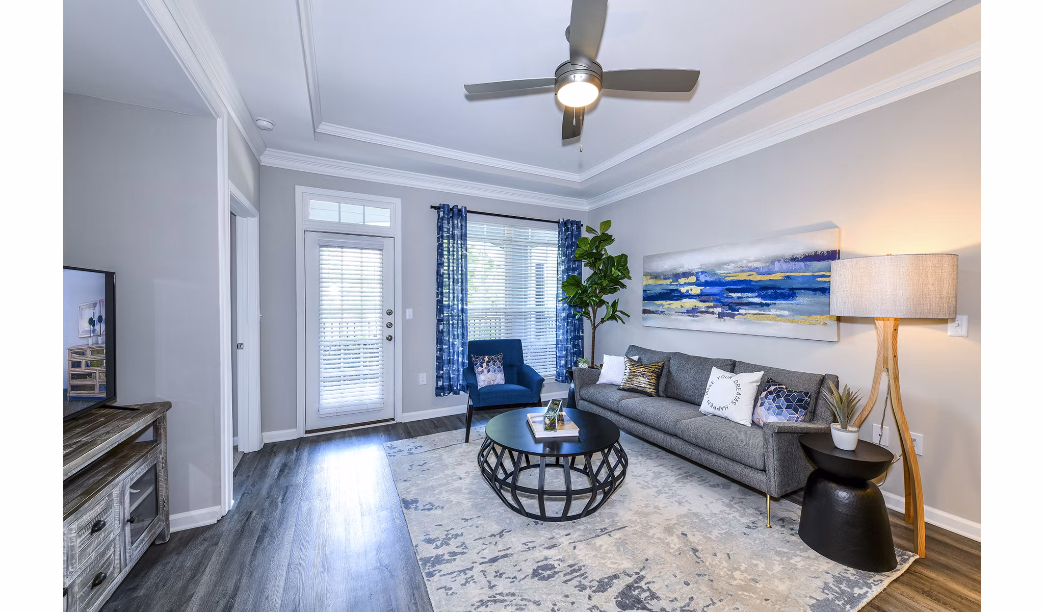 Dining room featuring modern furnishings and elegant lighting at Avana City North Apartments