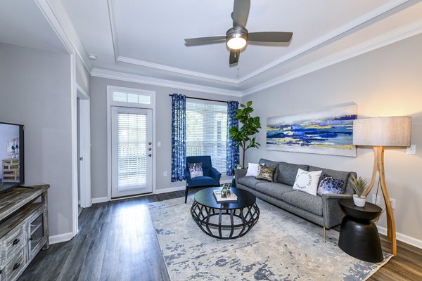 Dining room featuring modern furnishings and elegant lighting at Avana City North Apartments