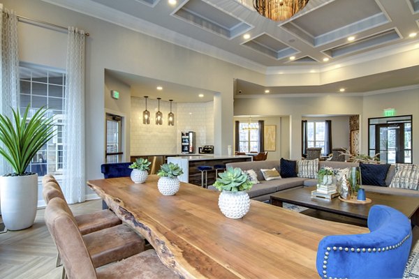 Luxurious clubhouse with modern seating and amenities at The Grand Reserve Apartments