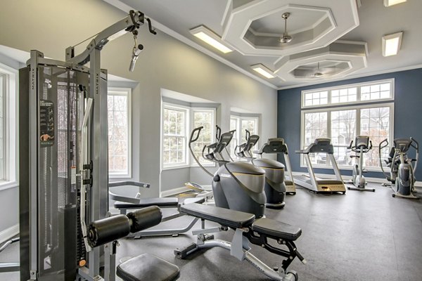 State-of-the-art fitness center with modern equipment at The Grand Reserve Apartments