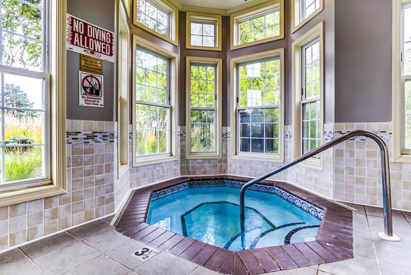 Bubbling hot tub amenity at The Grand Reserve Apartments offering relaxation and luxury