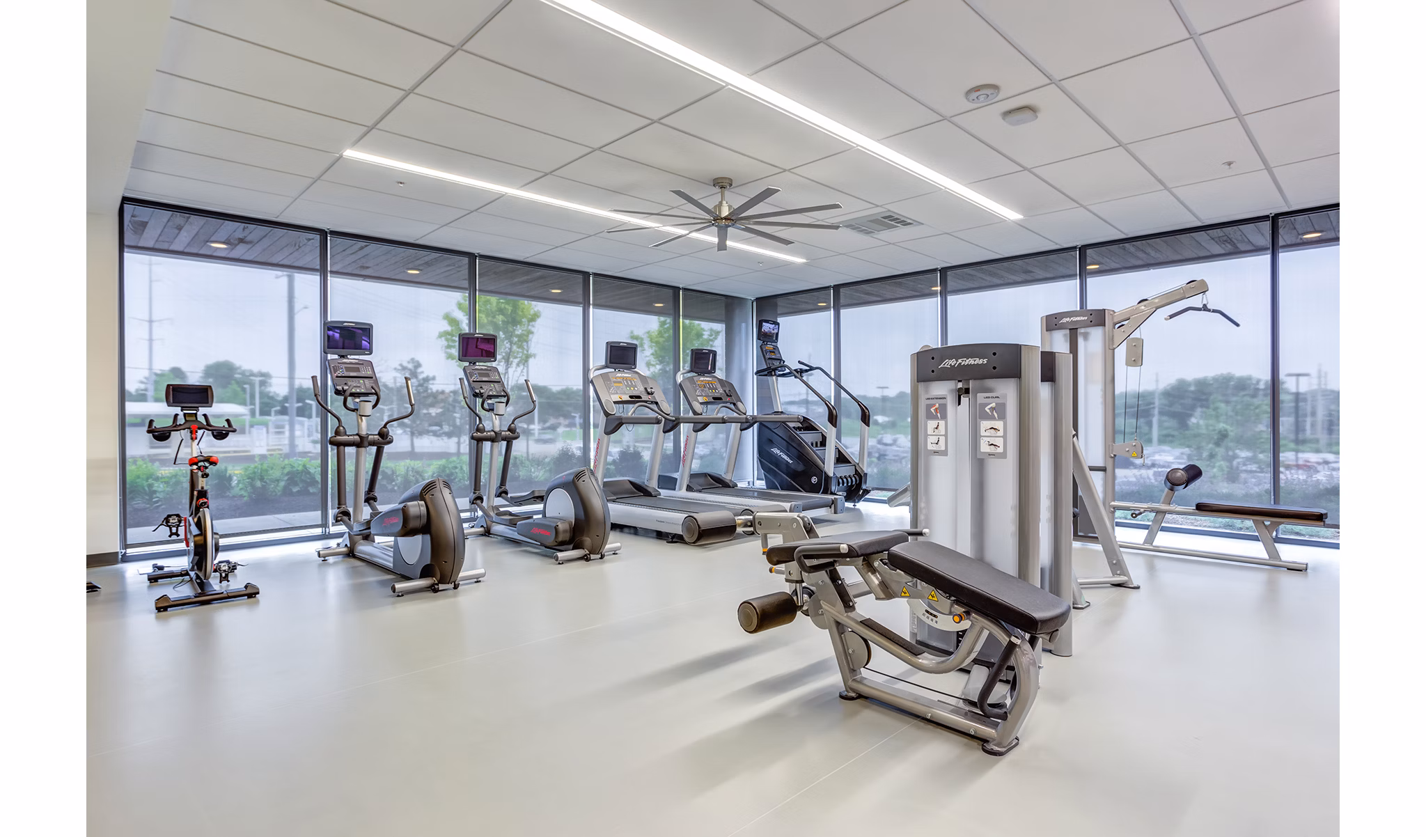 State-of-the-art fitness center with modern equipment at Sunnen Station Apartments, perfect for active lifestyles and workouts
