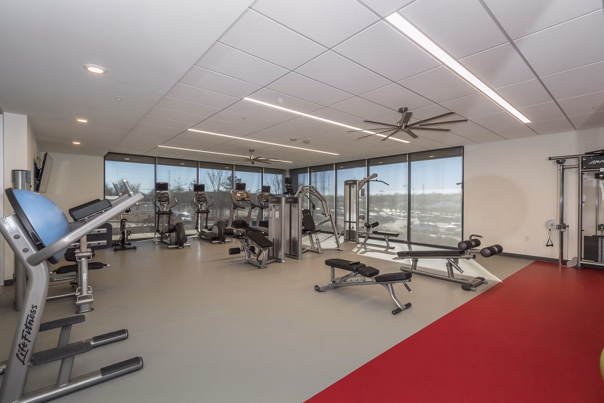 State-of-the-art fitness center with modern equipment at Sunnen Station Apartments