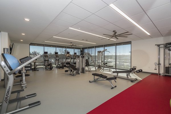 State-of-the-art fitness center with modern equipment at Sunnen Station Apartments