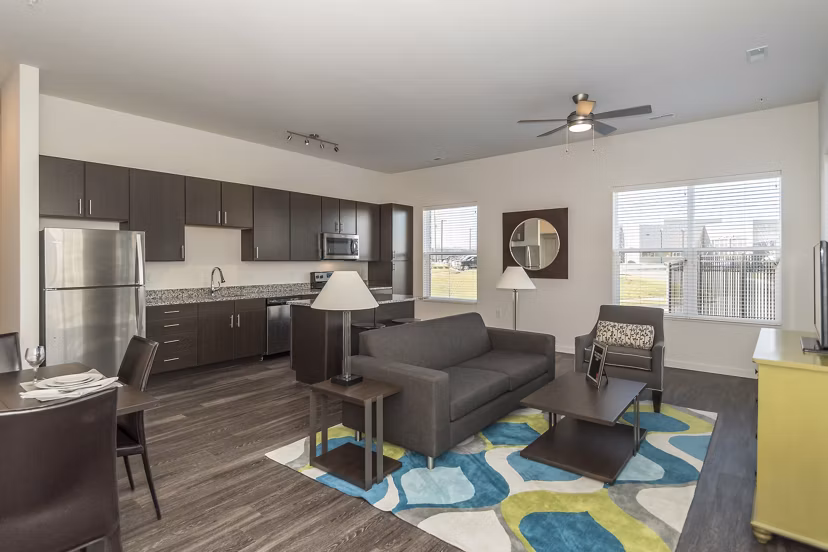 Modern living room with stylish furnishings in Sunnen Station Apartments