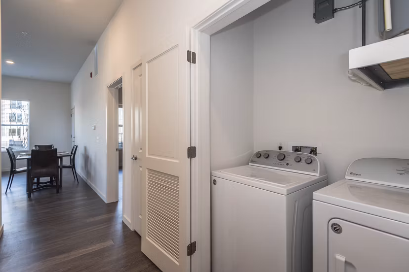 Convenient in-unit washer and dryer at Sunnen Station Apartments, offering modern amenities for easy living