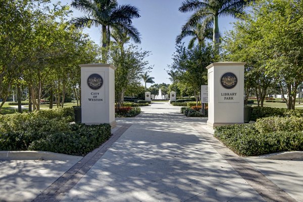 Quiet suburban neighborhood at La Morada at Weston luxury apartments with tree-lined streets and modern architecture