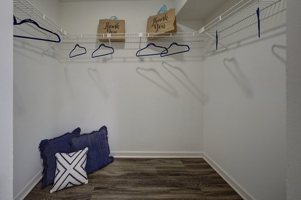 Walk-in closet with custom shelving in La Morada at Weston Apartments