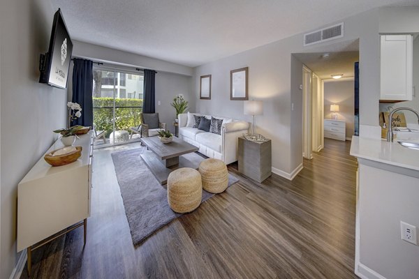 Spacious living room with modern decor in La Morada at Weston Apartments