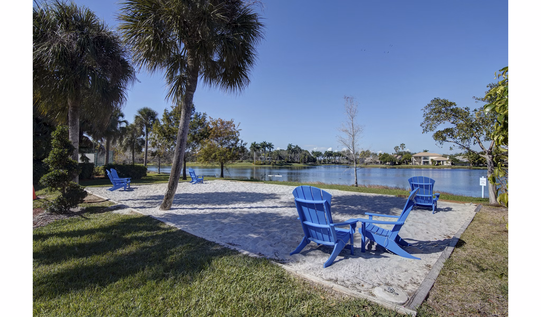 Sport court at La Morada at Weston Apartments featuring basketball hoops and spacious play area for residentsâ€