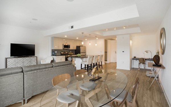 Modern dining room with elegant lighting fixtures at ONYX Glendale Apartments