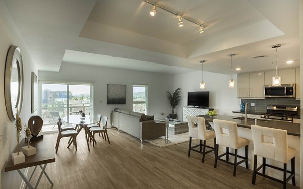 Spacious living room with contemporary furnishings at ONYX Glendale Apartments