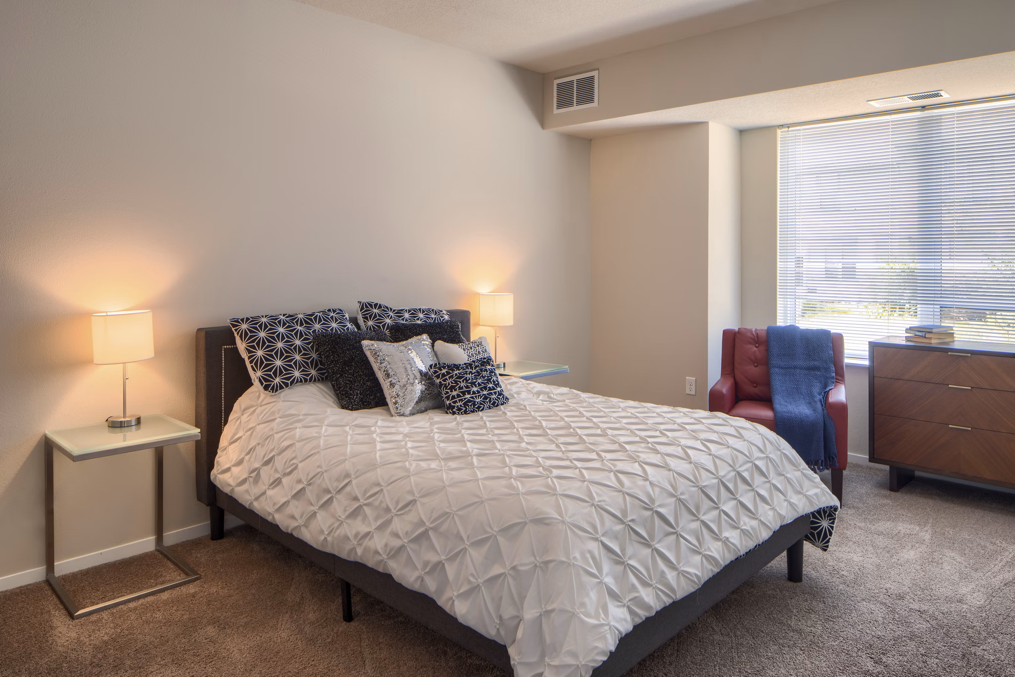 Cozy bedroom with modern furnishings at Grain Belt Apartments luxury homes