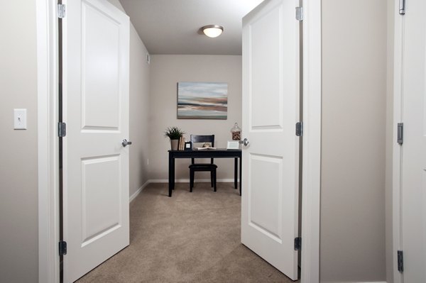 Modern home office with sleek design and ample storage at Grain Belt Apartments