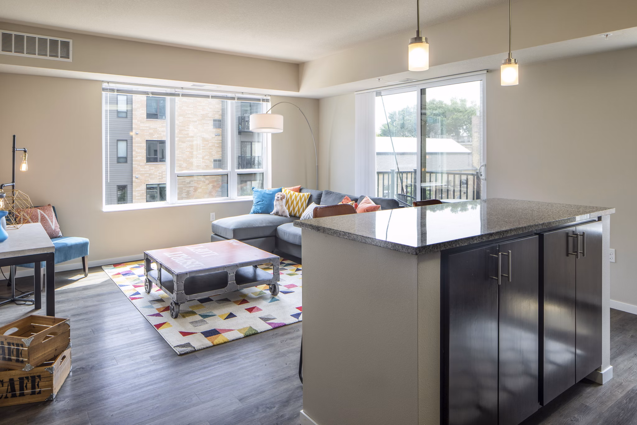 Open-concept kitchen with modern island at Grain Belt Apartments